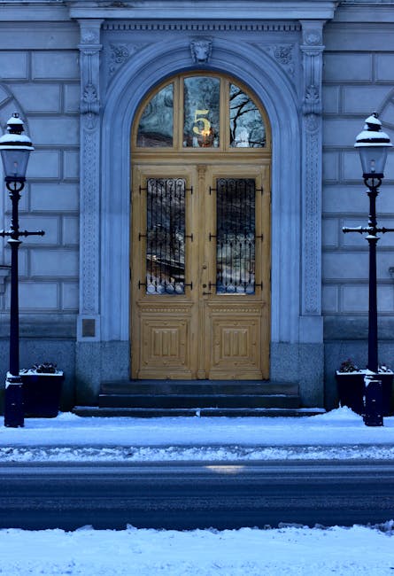 Ornate wooden double doors representing our secure business access