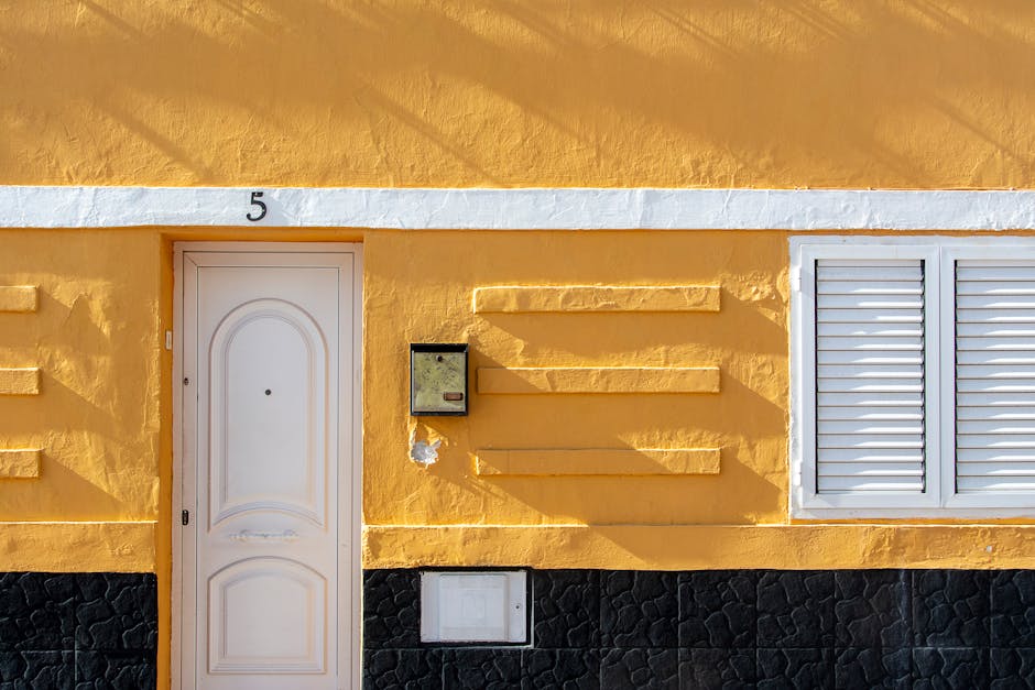 Professional yellow building exterior symbolizing our established presence